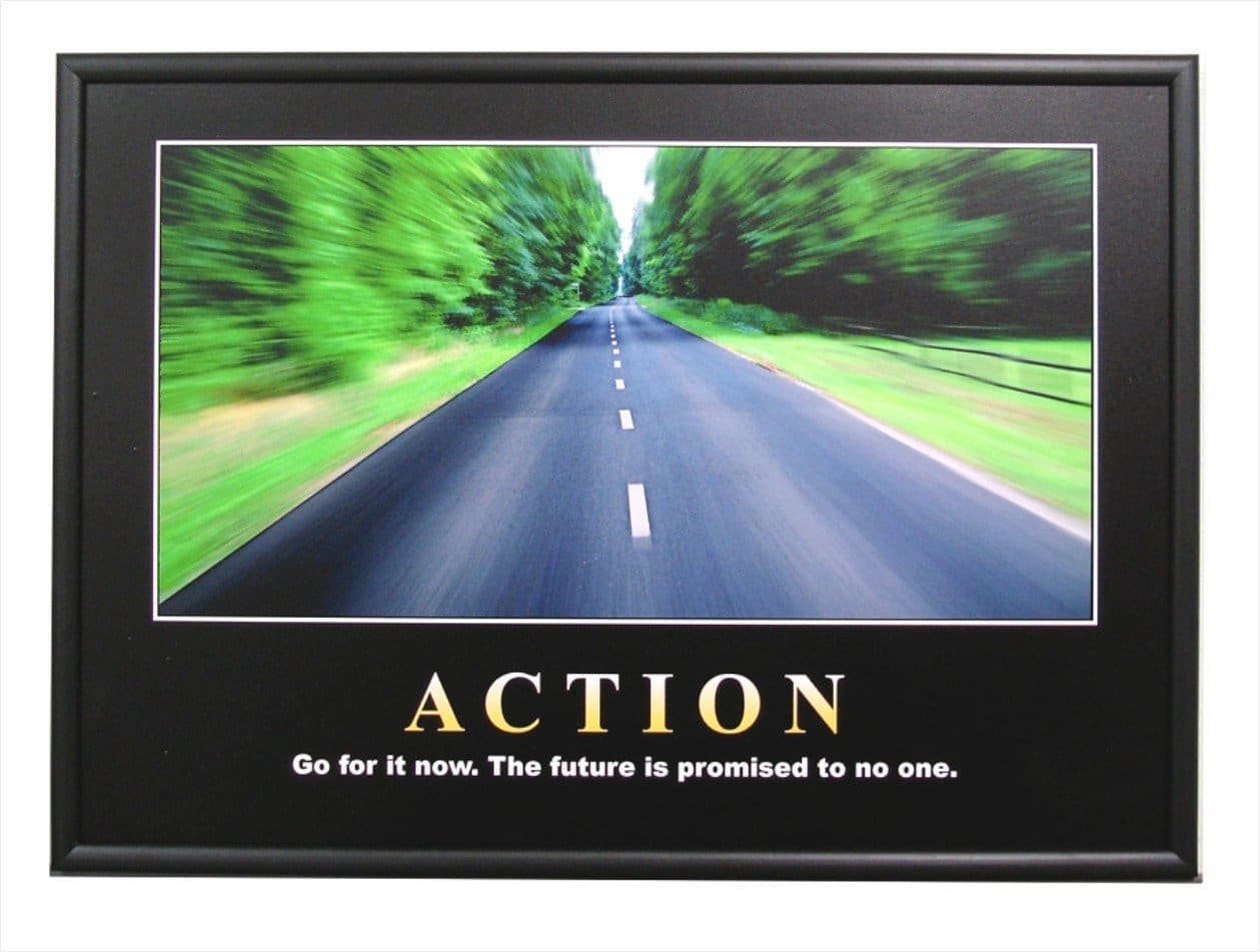 A motivational "Action" poster that has been professionally block mounted, showing how the service can transform posters into ready-to-hang wall art.