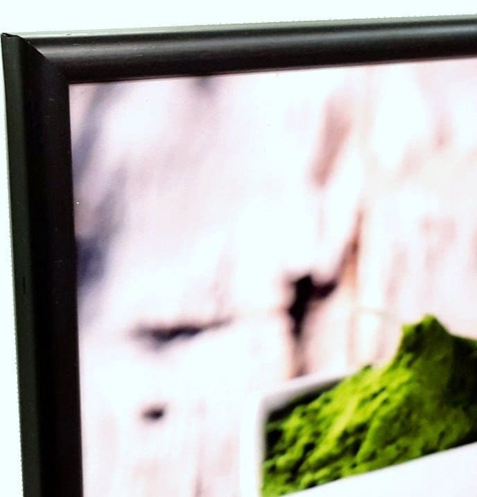 A close-up product shot of a corner of a professionally finished photo block mounting display, highlighting its sleek, clean look.